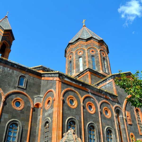 brown concrete church under blue sky during daytime